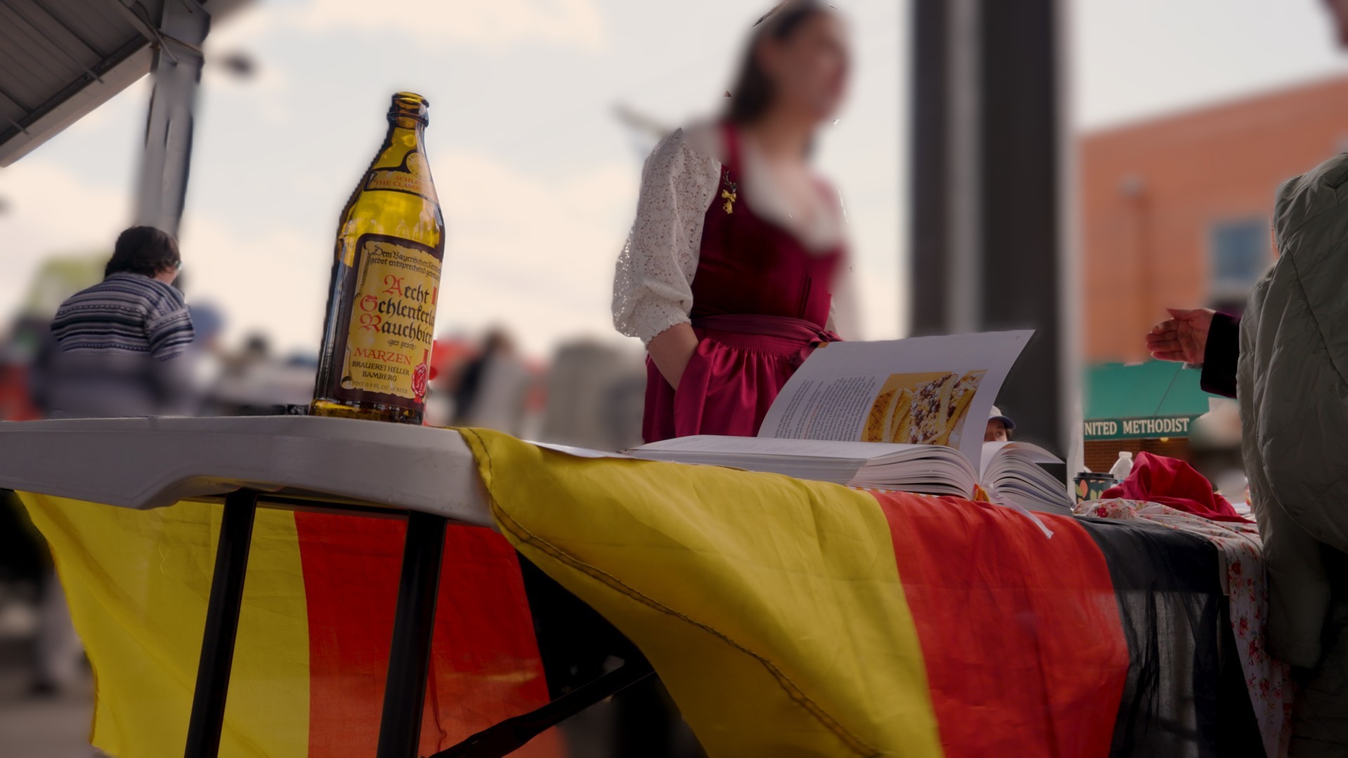 A scene from Morgantown's International Street Fair, where West Virginians and immigrant neighbors gather to share food, music, and culture.