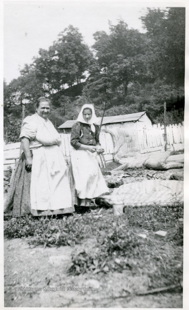 Two immigrant women tend their garden in West Virginia, early 20th century. West Virginia Regional History Center.